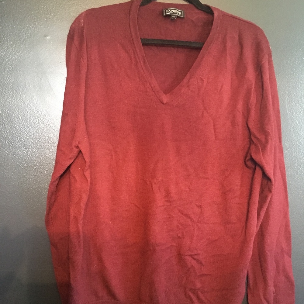 Maroon men’s v neck sweater.